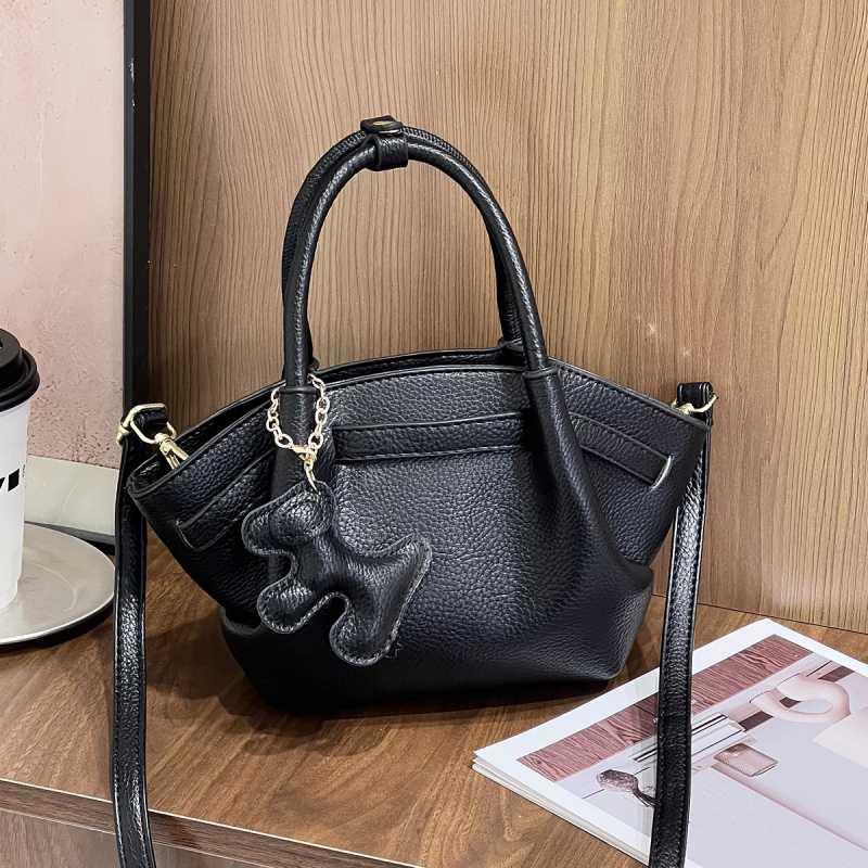 Ženska crossbody torbica, svestran minimalistički dizajn, mala kvadratna dumpling torbica, proljeće 2025