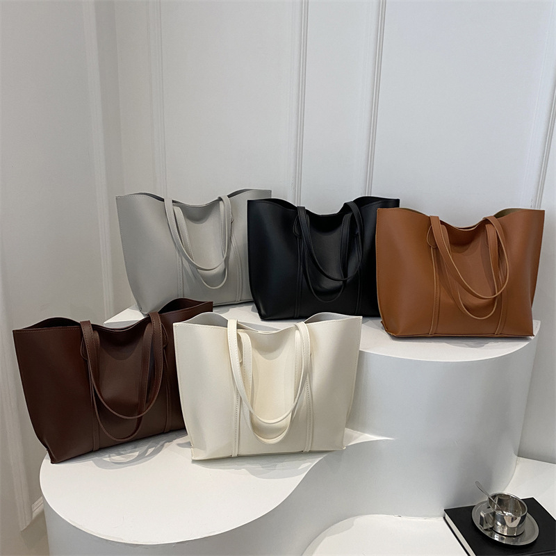 Ženska tote torba velikog kapaciteta, 2024 nova moda retro gradska svakodnevna torba, PU materijal, bucket oblik, zatvarač, srednja veličina, dvostruke naramenice