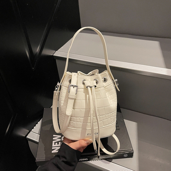 Ženska mini bucket torba u retro stilu, ljeto 2024, PU koža, crossbody torba s vrpcom za povlačenje