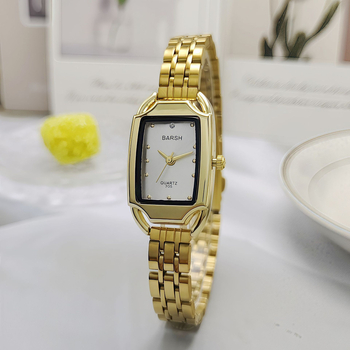 Ženski sat u zlatnom tonu, kvarc, pravokutno-metalno kućište, brojčanik 24 mm, debljina 7 mm, metalna narukvica, klasičan elegantan stil
