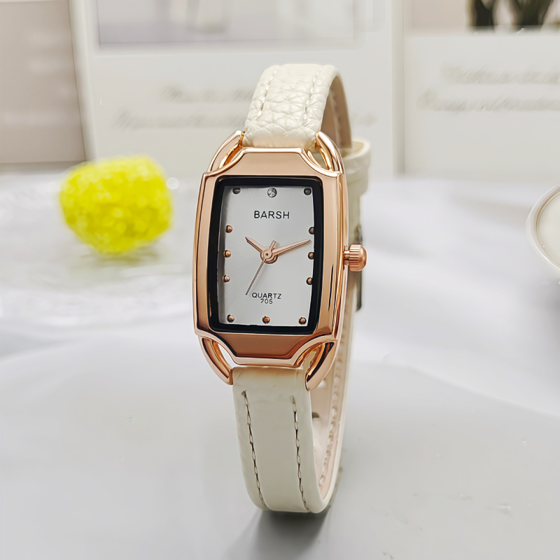 Ženski sat u zlatnom tonu, kvarc, pravokutno-metalno kućište, brojčanik 24 mm, debljina 7 mm, metalna narukvica, klasičan elegantan stil