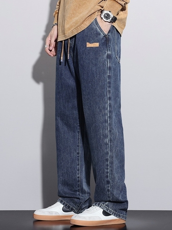 Férfiaknak szánt amerikai workwear stílusú farmerok, új tavasz–ősz modell, elasztikus derék, laza szabás, egyenes szárú, széles szárú, padlóig érő.