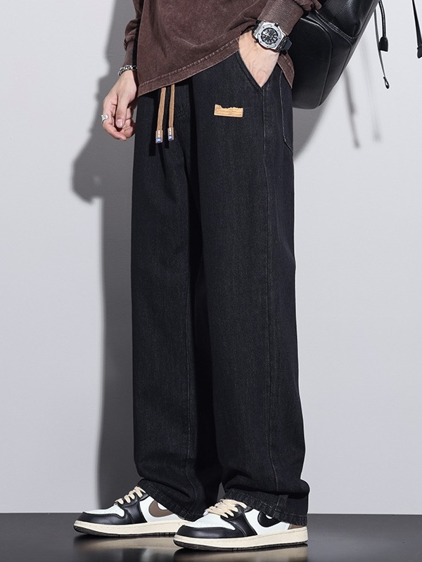Férfiaknak szánt amerikai workwear stílusú farmerok, új tavasz–ősz modell, elasztikus derék, laza szabás, egyenes szárú, széles szárú, padlóig érő.