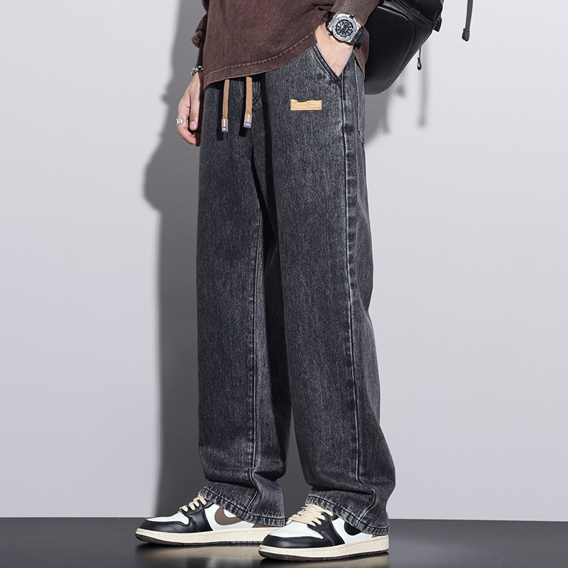 Férfiaknak szánt amerikai workwear stílusú farmerok, új tavasz–ősz modell, elasztikus derék, laza szabás, egyenes szárú, széles szárú, padlóig érő.