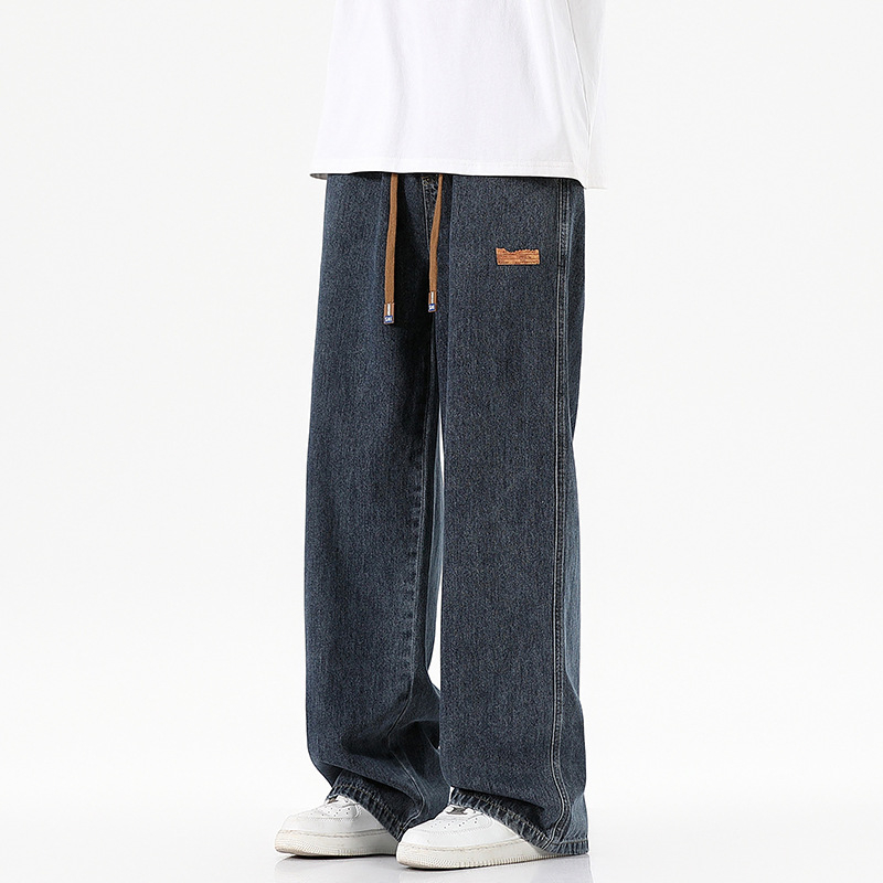 Férfiaknak szánt amerikai workwear stílusú farmerok, új tavasz–ősz modell, elasztikus derék, laza szabás, egyenes szárú, széles szárú, padlóig érő.