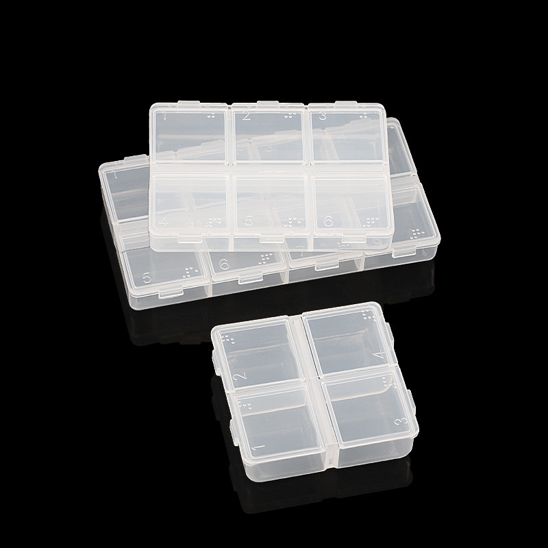 Cutie transparentă pentru accesorii de manichiură, cu capac rabatabil și compartimente separate pentru perle, mărgele și strasuri