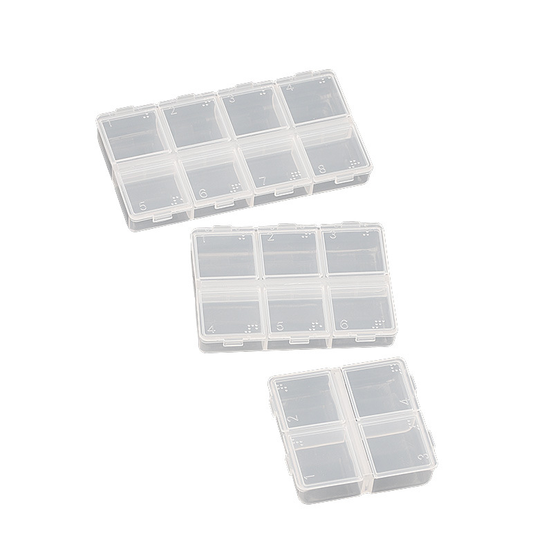 Cutie transparentă pentru accesorii de manichiură, cu capac rabatabil și compartimente separate pentru perle, mărgele și strasuri
