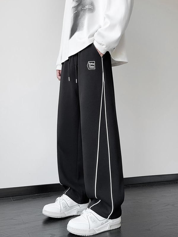 Pantaloni sport casual pentru băieți tineri, primăvară-toamnă, croială largă, drepti, talie medie-înaltă, închidere cu șiret, imprimeu text