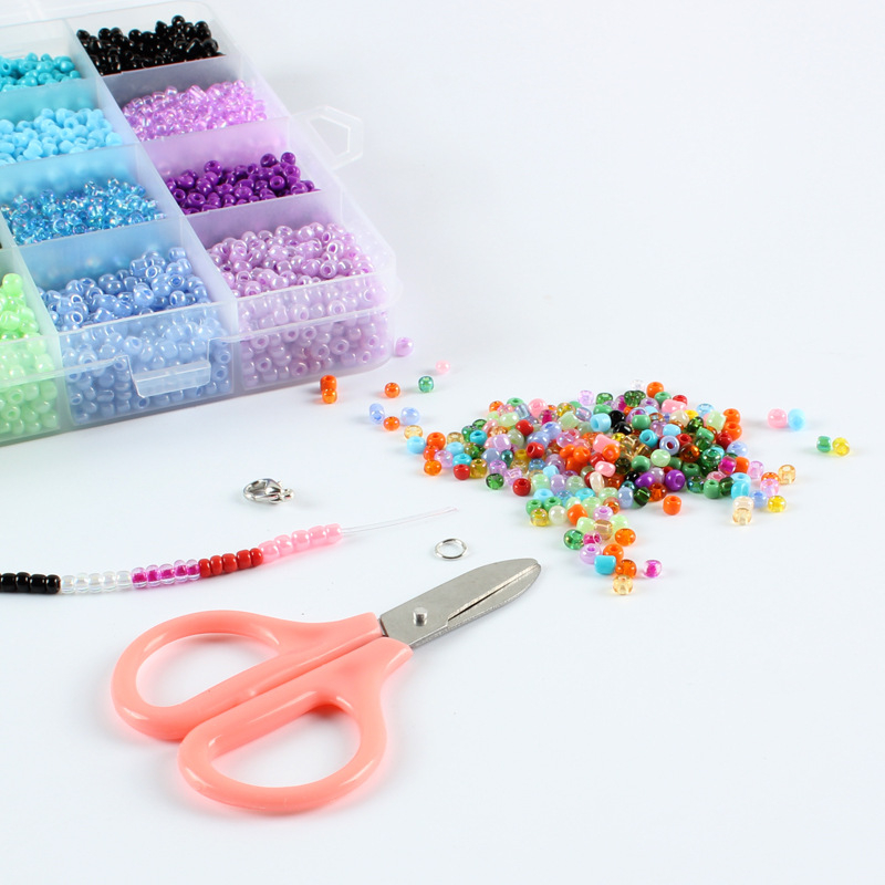 Set s 24 priehradkami: farebné sklenené korálky a nástroje pre krížové vyšívanie a DIY šperky