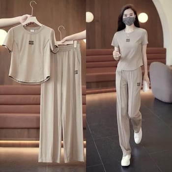 Ženski ljetni dvodijelni set: majica kratkih rukava i široke hlače, casual sportski stil