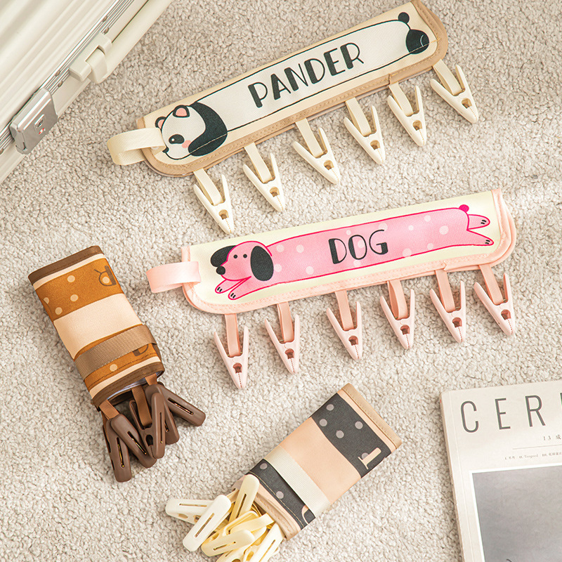 Prijenosna platnena sklopiva vješalica za putovanja i boravak u hotelu, pogodna za čarape i donje rublje.