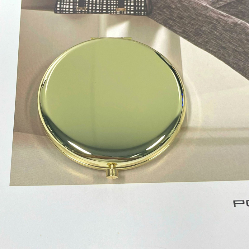 65 mm διπλής όψεως μεταλλικός κυκλικός καθρέφτης μακιγιάζ, αναδιπλόμενος, με χάραξη, φορητός