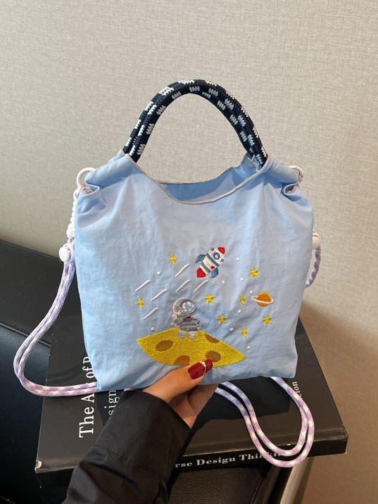 Ženska moderna mini crossbody torba u jednobojnoj boji s izvezenim cartoon motivom – praktična svakodnevna torba preko ramena s pretincem za telefon