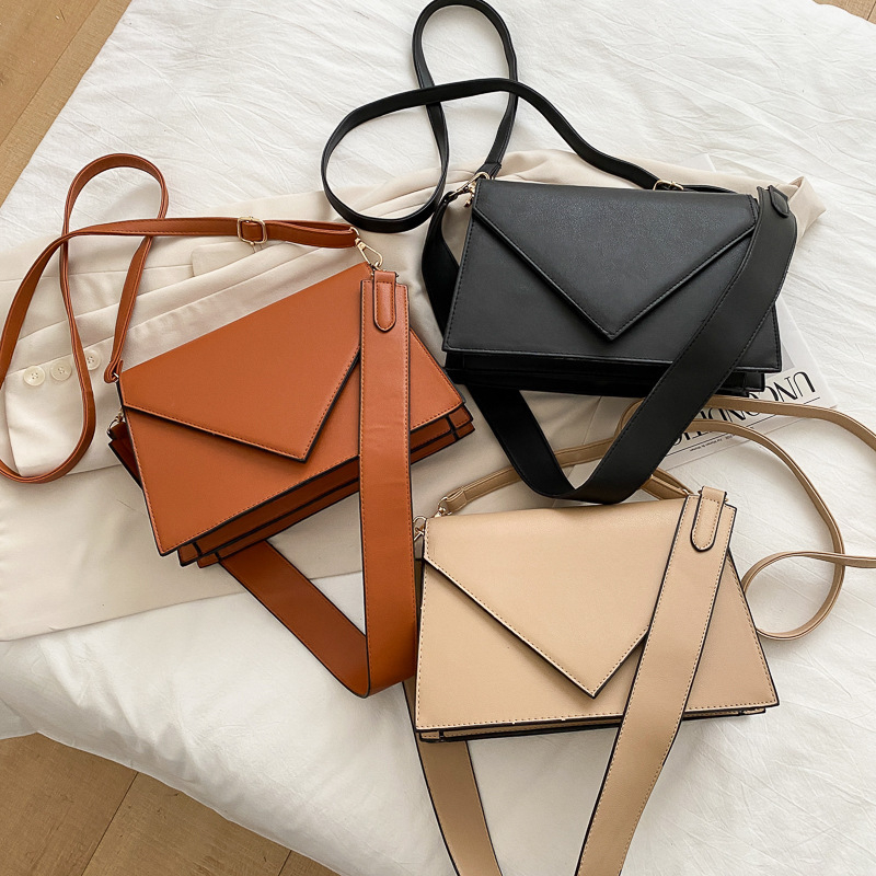 Ženska torbica ulično-stilskog izgleda, crossbody s širokim remenom, kompaktna moderna torbica