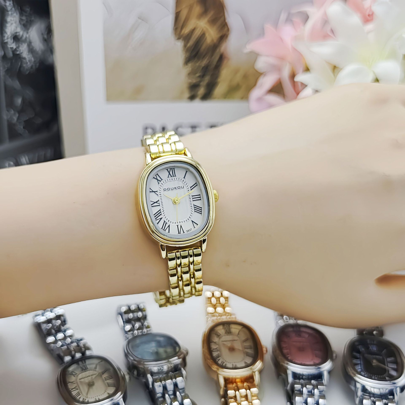 Γυναικείο ρολόι Quartz με μπρασελέ από ανοξείδωτο ατσάλι, οβάλ καντράν, ρωμαϊκούς αριθμούς, χρυσό τόνο, κομψό καθημερινό στυλ