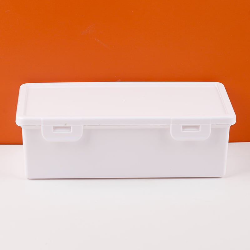 Bijela prozirna pravokutna kutija za pohranu s podiznim poklopcem za olovke i uredsku organizaciju, dimenzije 18,5 × 6 × 9 cm