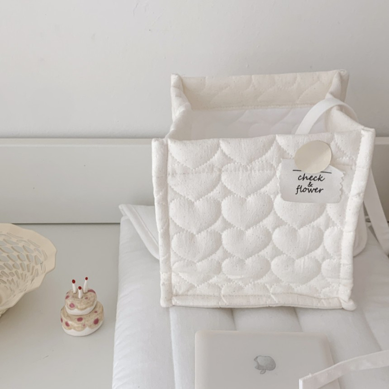 Kremasto bijela kvadratna kutija za pohranu od pamuka s quilted dizajnom, sklopiva, velika kapaciteta za svakodnevnu upotrebu.