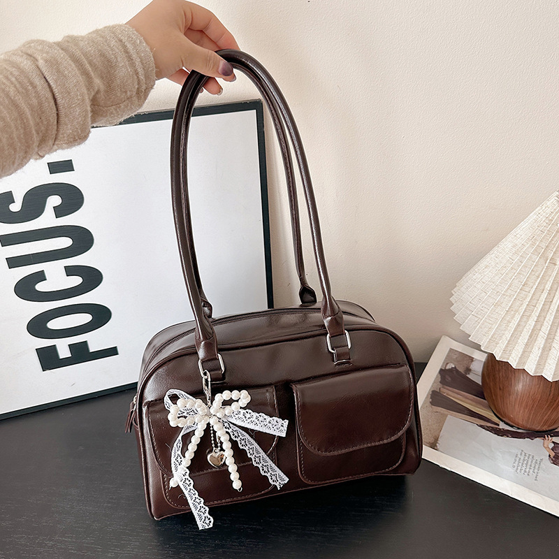 Ženska crossbody torba s bisernom mašnicom, korejski dizajn, 2025