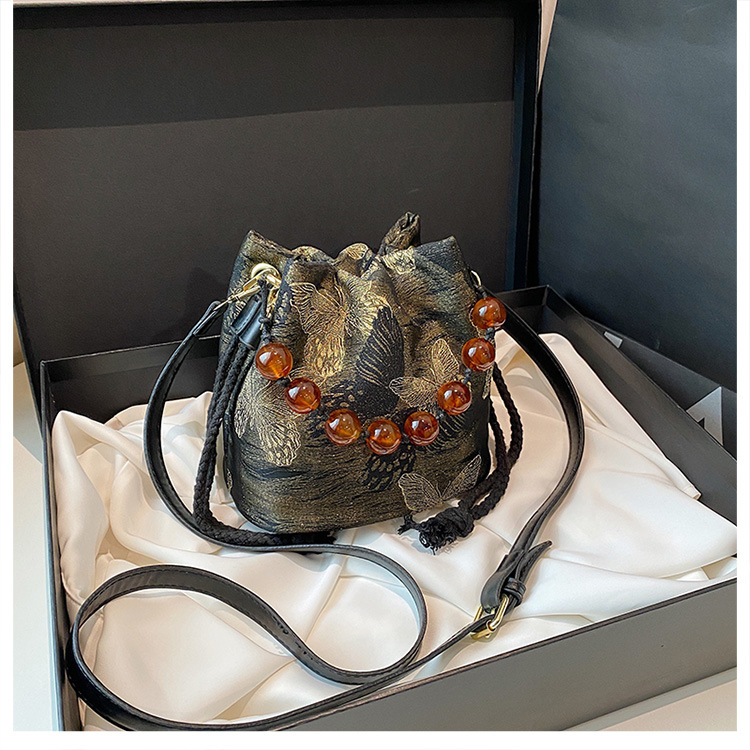 Pearl ženska crossbody torbica, 2026 proljeće-ljeto, minimalistička bucket bag, koreanskog stila, vrhunska kvaliteta