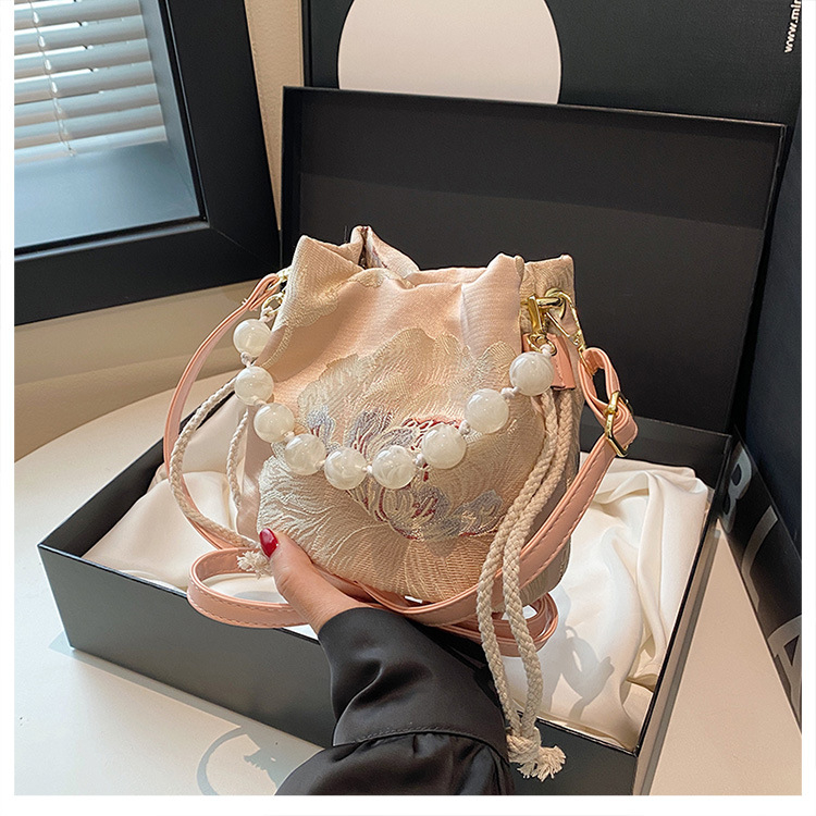 Pearl ženska crossbody torbica, 2026 proljeće-ljeto, minimalistička bucket bag, koreanskog stila, vrhunska kvaliteta