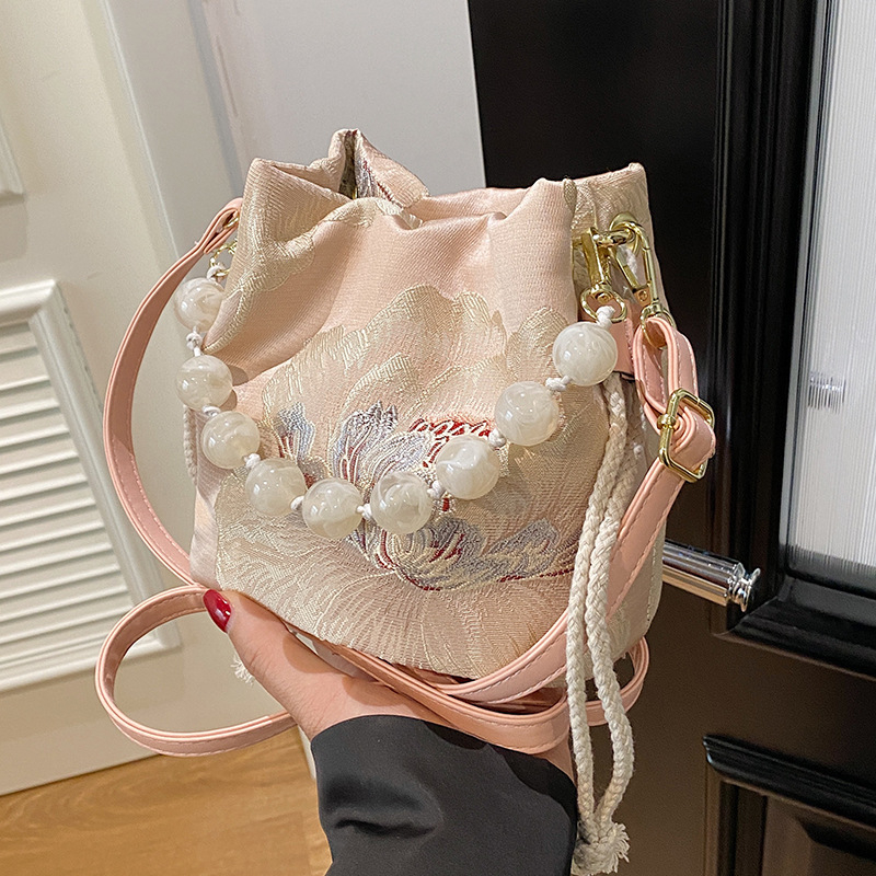Pearl ženska crossbody torbica, 2026 proljeće-ljeto, minimalistička bucket bag, koreanskog stila, vrhunska kvaliteta