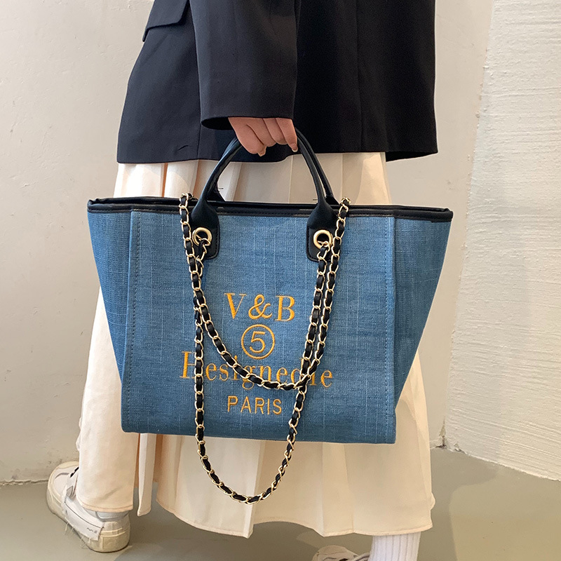 Ženska denim torba, 2025 novi model, velika kapaciteta, torba za rame ili crossbody, s izvezenim detaljima