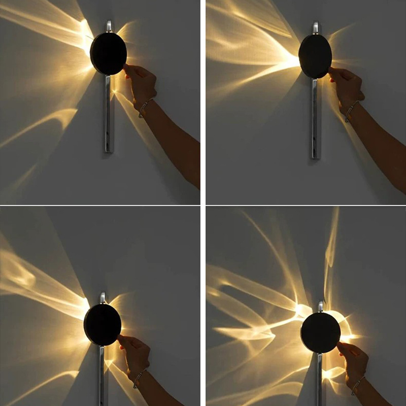 Punjavajuća talijanska minimalistička dizajnerska stenska lampa s učinkom svjetla i sjene, pogodna za dnevni boravak ili spavaću sobu.
