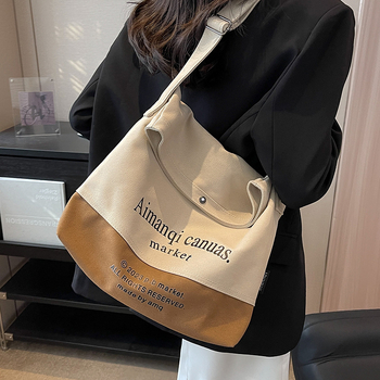 Ženska platnena torba s velikim kapacitetom, novi model 2026, crossbody torba s kontrastnim blokovima boja, svakodnevna tote torba, korejski ulićni stil