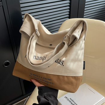 Ženska platnena torba s velikim kapacitetom, novi model 2026, crossbody torba s kontrastnim blokovima boja, svakodnevna tote torba, korejski ulićni stil