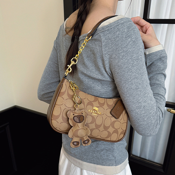 Ženska visoke kvalitete kvadratna crossbody torba, 2026 novi stil, elegantan i moderan retro dojam