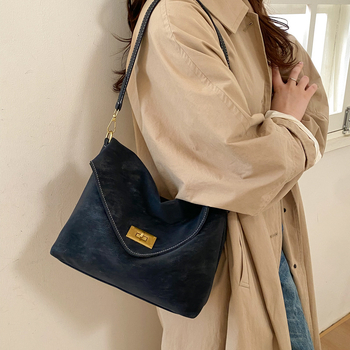 Ženska crossbody torbica visokokvalitetna, inspirirana vintage stilom 2026, svestrana i teksturirana za svakodnevnu upotrebu