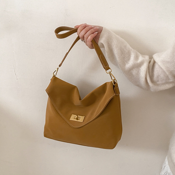 Ženska crossbody torbica visokokvalitetna, inspirirana vintage stilom 2026, svestrana i teksturirana za svakodnevnu upotrebu