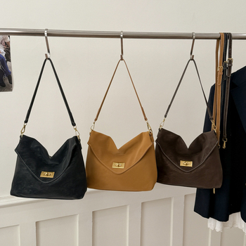 Ženska crossbody torbica visokokvalitetna, inspirirana vintage stilom 2026, svestrana i teksturirana za svakodnevnu upotrebu