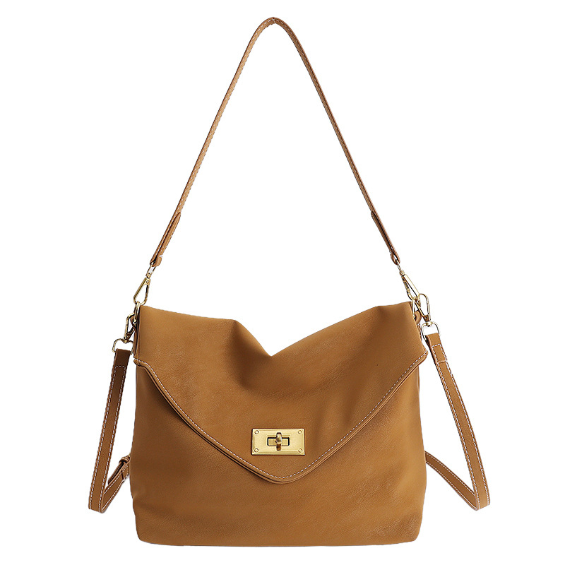 Ženska crossbody torbica visokokvalitetna, inspirirana vintage stilom 2026, svestrana i teksturirana za svakodnevnu upotrebu