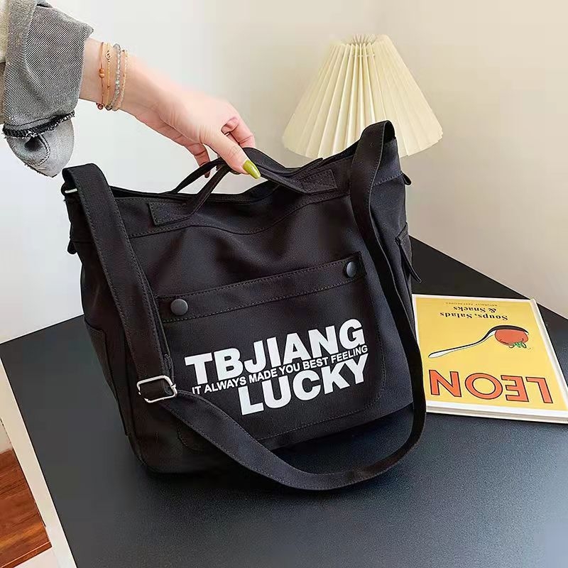 Nova platnena torba, korejskog stila za rame i crossbody, s natpisom slovima, velika kapaciteta za učenike