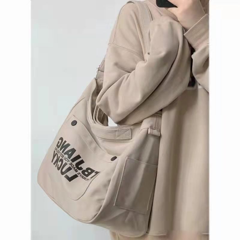 Nova platnena torba, korejskog stila za rame i crossbody, s natpisom slovima, velika kapaciteta za učenike