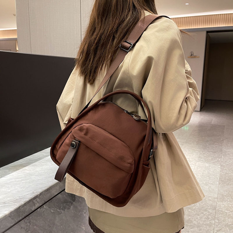 Ženska crossbody torba, minimalistička, laka, svakodnevna, preko ramena