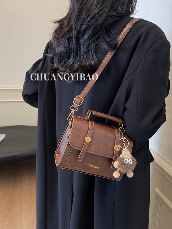 Ženska crossbody torba za jesen/zimu, 2026 novi model, dojam vrhunske kvalitete, svestrana mala kvadratna torba s retro stilom