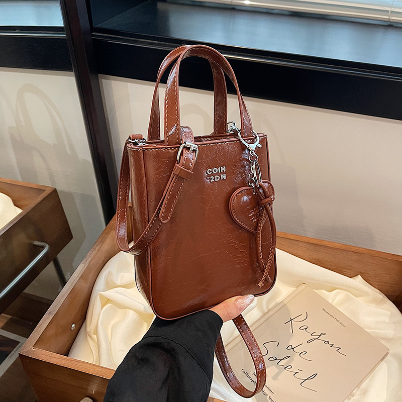 Ženska crossbody torbica 2025, novi stil, minimalistička mala kvadratna torbica za ramenu za posao