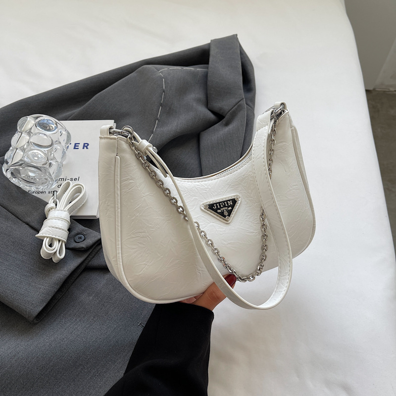 2025 nova ženska crossbody torba sa zapadnjačkim stilom, nišni dizajn, mala i svestrana