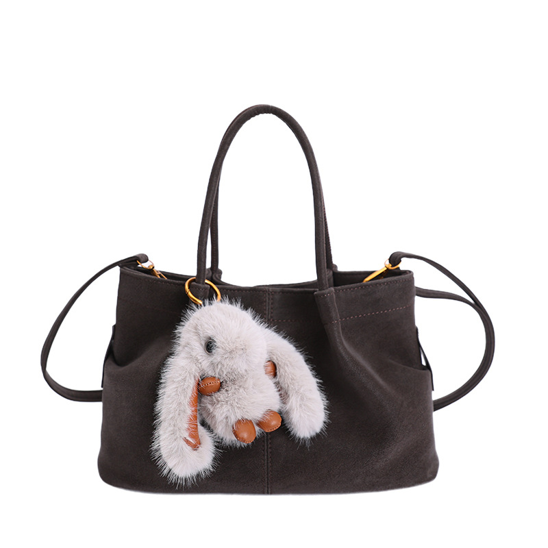 Ženska torba u retro stilu za svakodnevnu uporabu, novi model 2025, minimalist tote, s ramenskim i crossbody remenom.