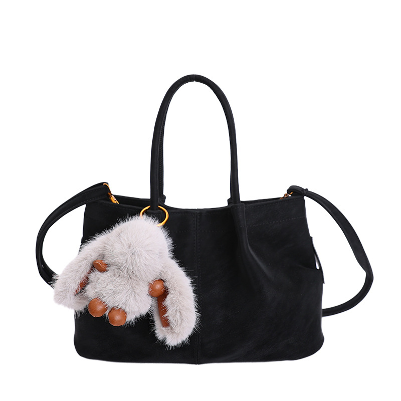 Ženska torba u retro stilu za svakodnevnu uporabu, novi model 2025, minimalist tote, s ramenskim i crossbody remenom.