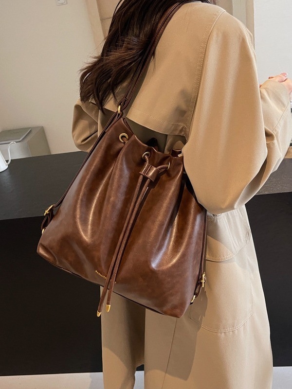 Retro stil bucket torba s crossbody remenom, velika zapremina za žene, novi model 2025, moderni i svestrani za rame ili ruksak