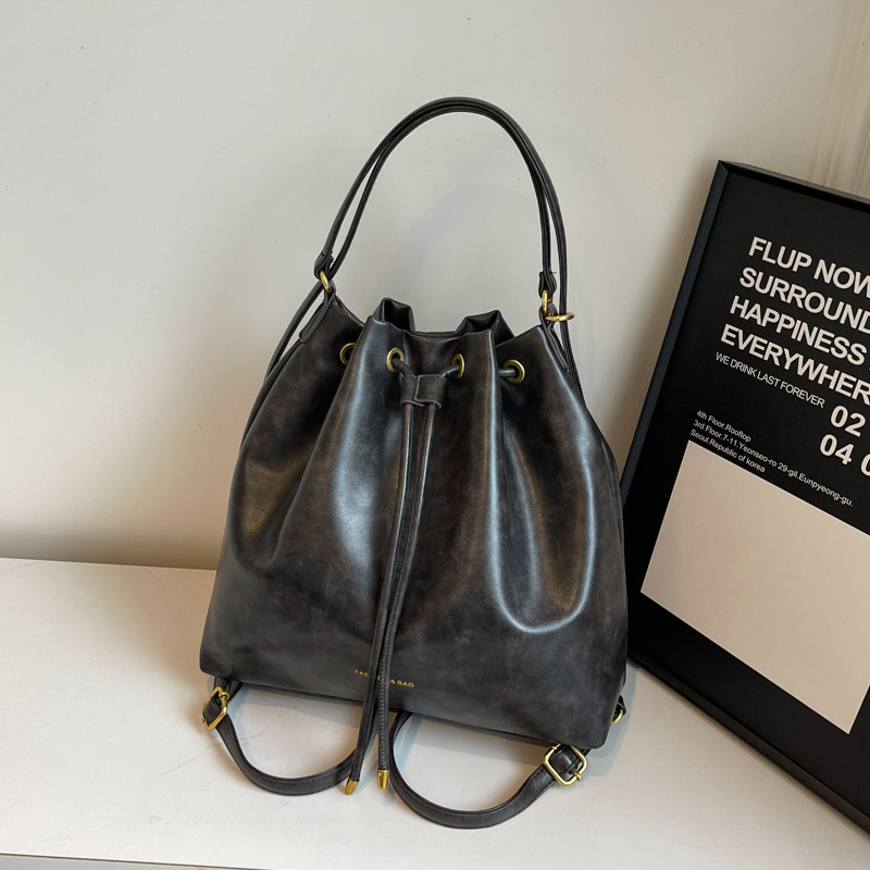 Retro stil bucket torba s crossbody remenom, velika zapremina za žene, novi model 2025, moderni i svestrani za rame ili ruksak