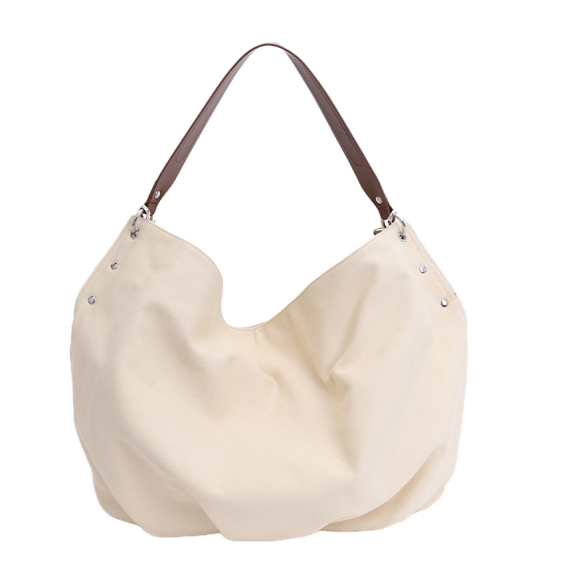Retro opuštenog stila torbica ispod pazuha za svakodnevnu upotrebu — dumpling oblik, crossbody, jesen 2025