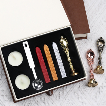 Set de ștampile pentru ceară, cu capete de ștampilă, mânere, lingurițe și unelte pentru ceară — cutie cadou