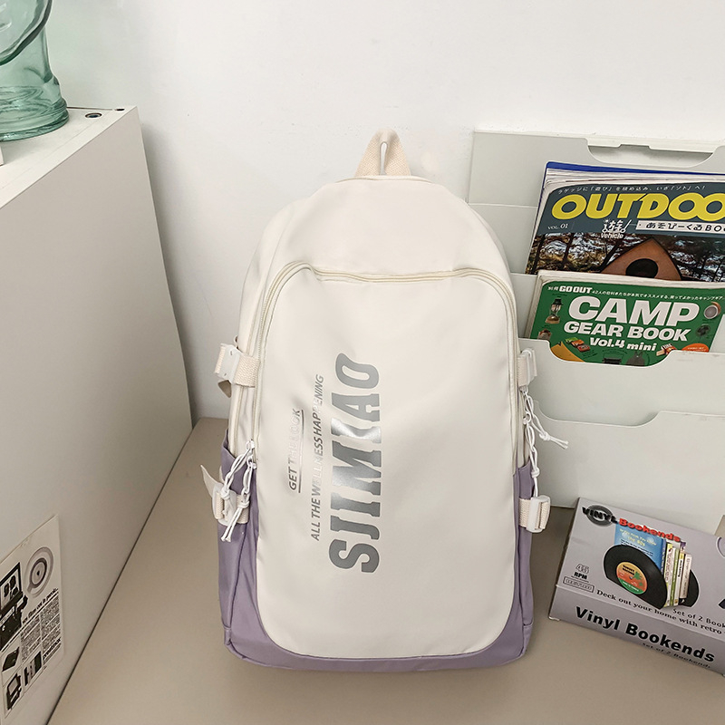 Nylon hátizsák diákoknak nagy kapacitással, laptoprekesz, több zseb, légáteresztő, vízálló, lopás elleni védelem.