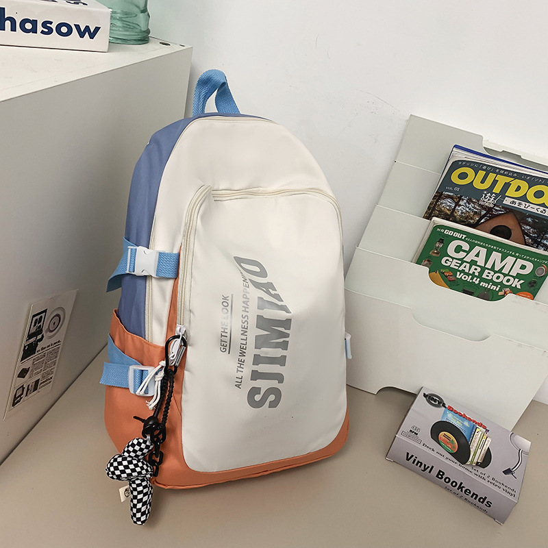 Nylon hátizsák diákoknak nagy kapacitással, laptoprekesz, több zseb, légáteresztő, vízálló, lopás elleni védelem.