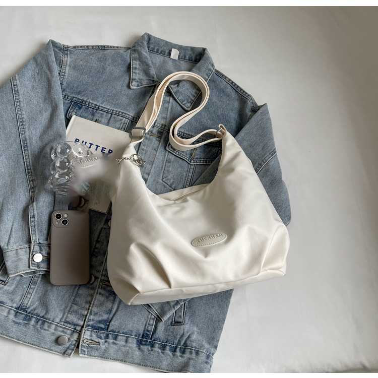 Ženska platnena torbica za rame, velika kapaciteta, casual stil, crossbody, proljeće 2026