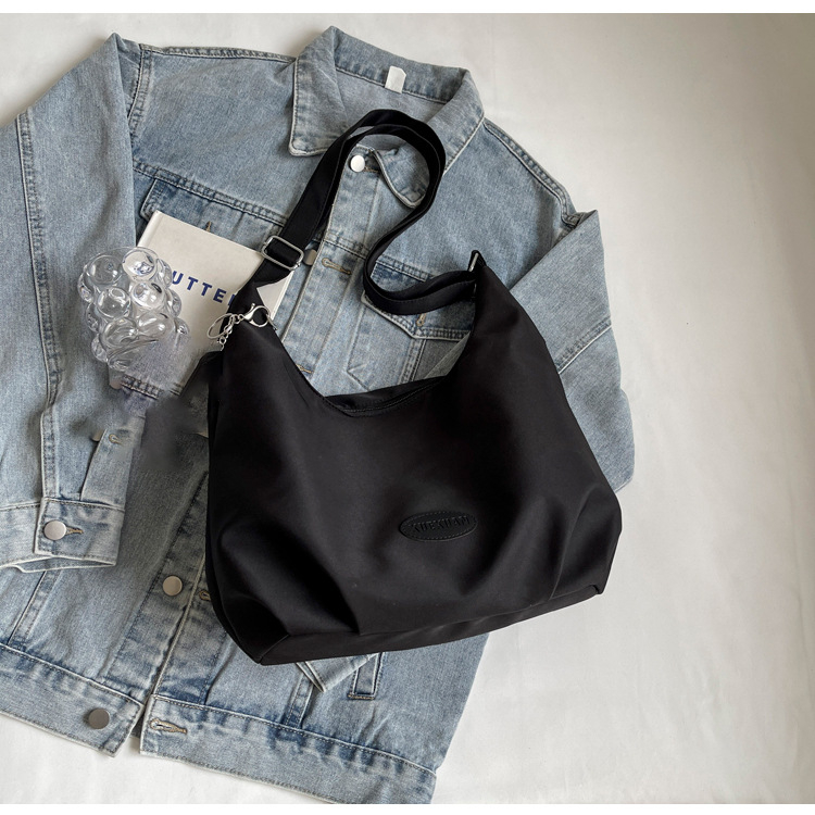 Ženska platnena torbica za rame, velika kapaciteta, casual stil, crossbody, proljeće 2026